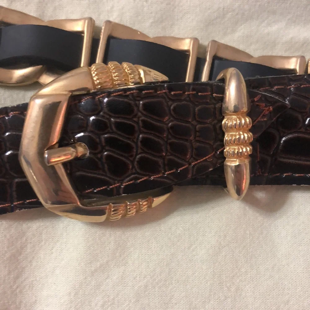 Gold and brown belt 35 inches to first hole. Size M